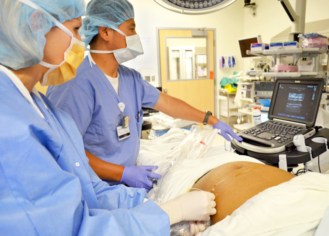 doctors working on patient