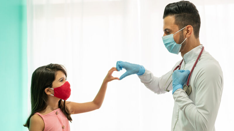 Heart Shaped Hands with Doctor - child